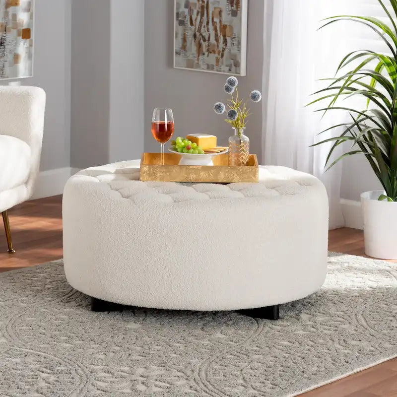 Repose-pieds rond en bois noir avec coussin en velours ivoire de style moderne